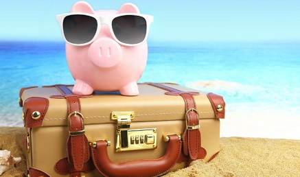 Tirelire cochon en vacances