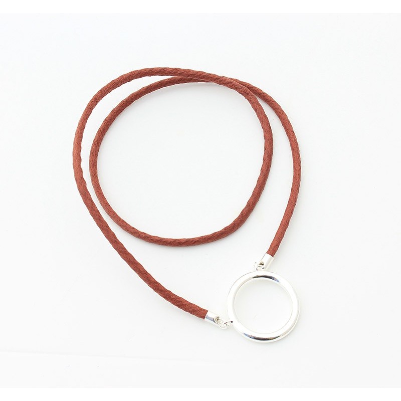 Large plated silver ring pendant with Rust braided cotton